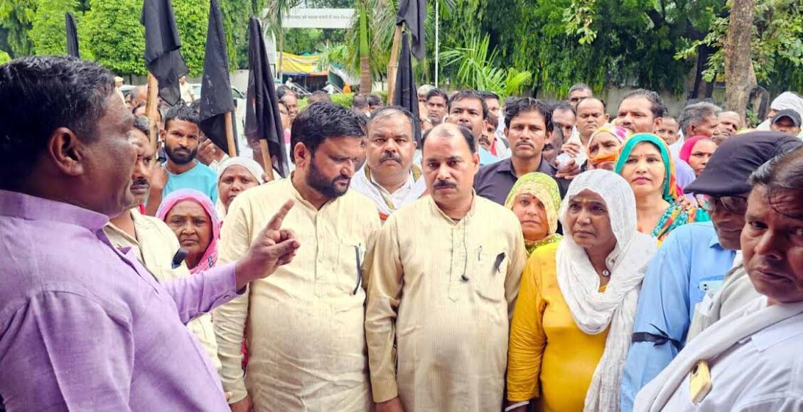 Corporation employees staged a strong protest with black badges and flags