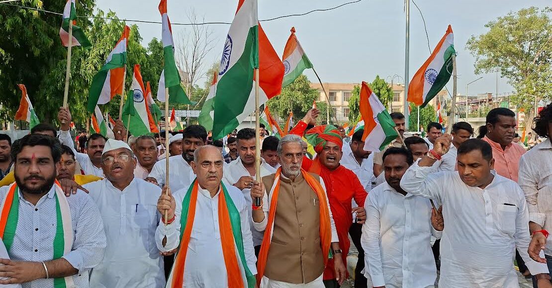 Union Minister of State Krishan Pal Gurjar riding a bike during the Tiranga Yatra in Ballabhgarh Assembly