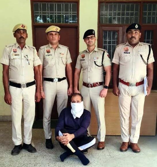 Police arrested the accused who was absconding for seven years in a scam worth crores.