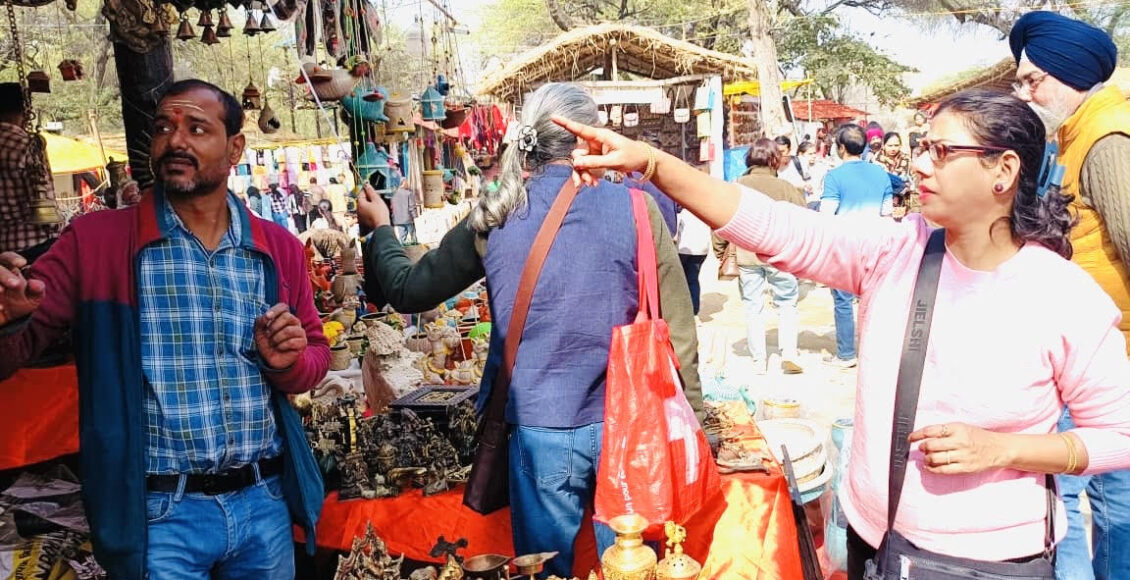 Uttar Pradesh's brass craftsmanship attracts tourists' attention at the Surajkund International Crafts Fair