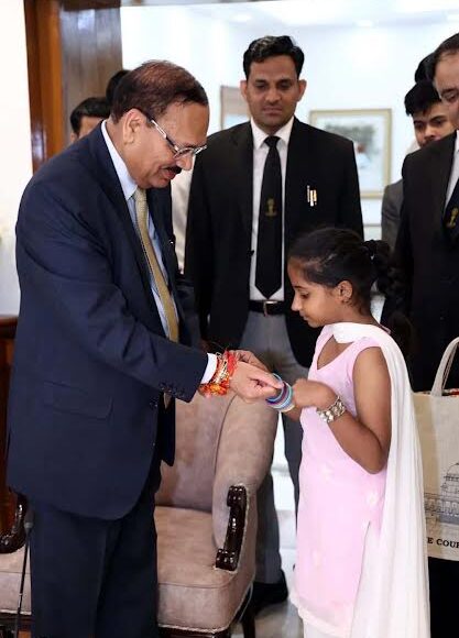 Srishti, a daughter of Faridabad, tied a Rakhi to CJI Surya Kant.