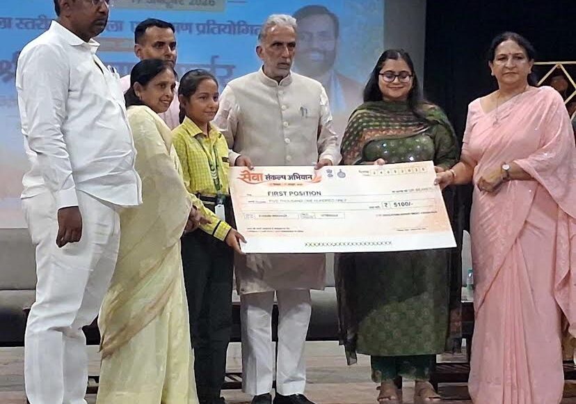 Kanika secures first place in district-level speech competition; honored by Union Minister.