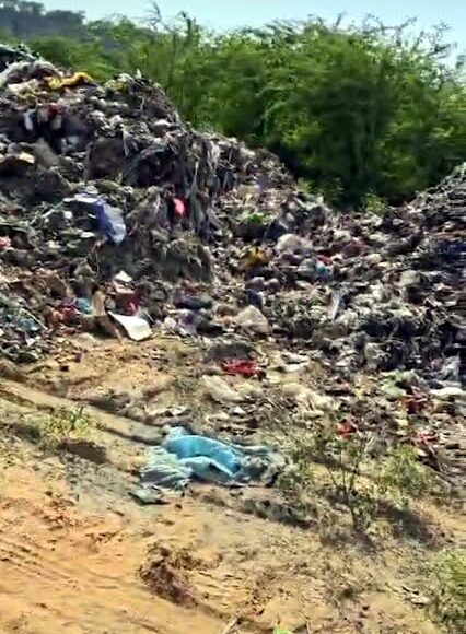 People rally against dumping yard, voice their protest.